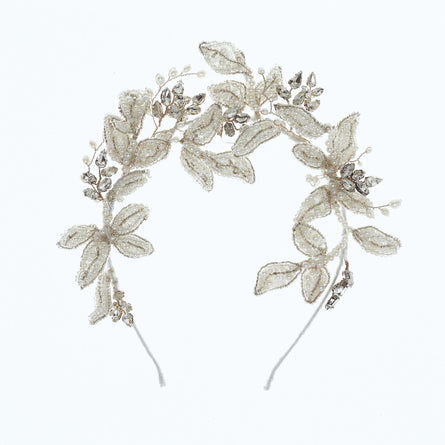 Wedding headpiece of lace embellished leaves of crystal and pearls