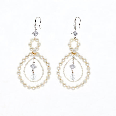 Statement pearl chandelier earrings with gold or silver settings 